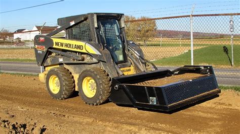 skid steer rake picker|power rake for skid steer.